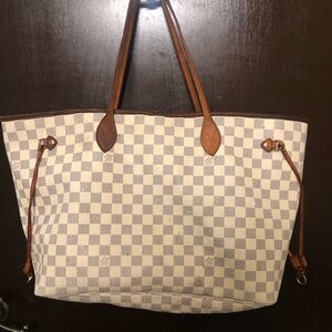 This is an authentic LOUIS VUITTON Damier Azur Neo Neverfull GM